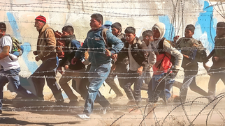 Migrant Group Clashes with Texas National Guard at U.S. Border